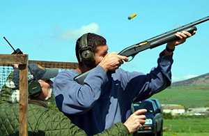 Ken Bennett coaching clay pigeon shooting